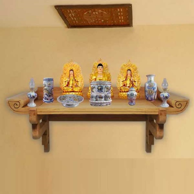 Bạn đang tìm kiếm cho không gian nhỏ nhà bạn một bộ bàn thờ Phật treo tường? Hãy tham khảo mẫu bàn thờ này! Với thiết kế nhỏ gọn, tinh xảo, độ bắt mắt cao, bộ bàn thờ này sẽ không chỉ giúp bạn tạo ra không gian thờ cúng Phật giản đơn và tiện lợi, mà còn trang trí thêm cho ngôi nhà của bạn một nét đặc trưng của văn hóa và tôn giáo.